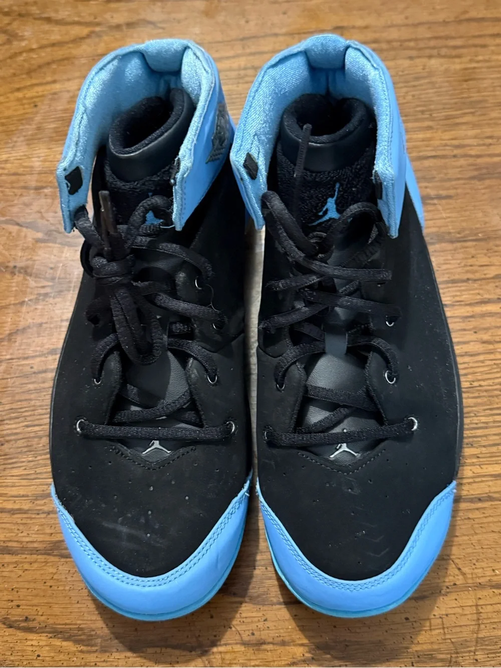 Kids Nike Melo 1.5 shoes black/university blue.